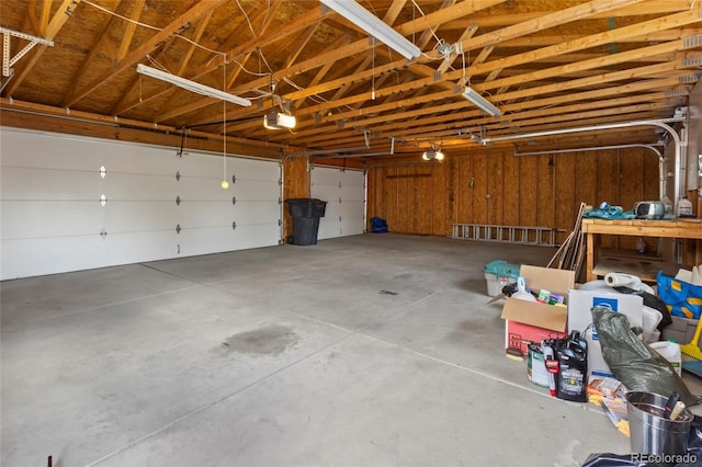 1400 S Knox Ct, Denver, CO 80219 - garage featuring a garage door opener
