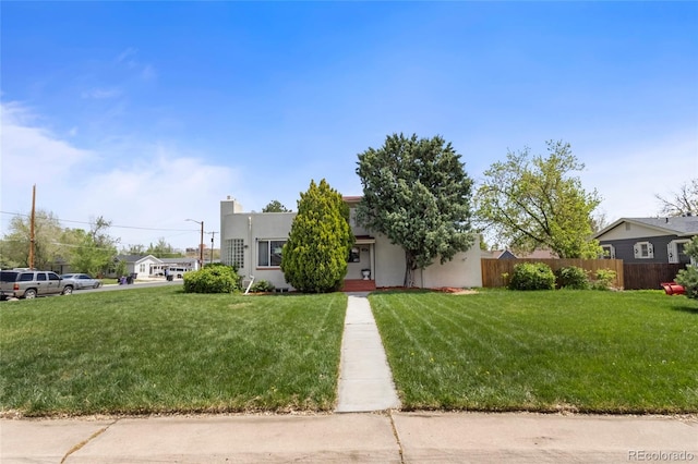 1400 S Knox Ct, Denver, CO 80219 - view of front facade with stucco siding