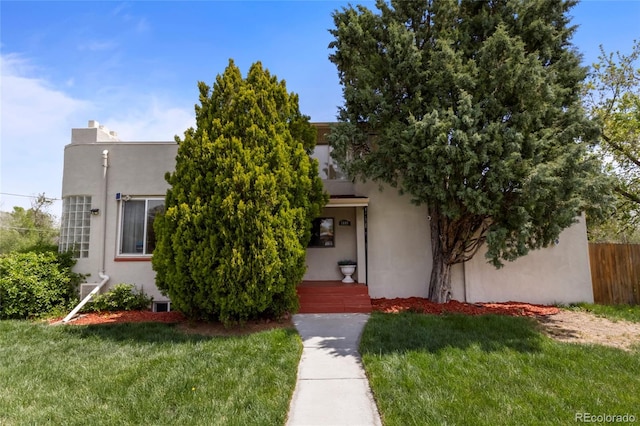 1400 S Knox Ct, Denver, CO 80219 - view of front facade with stucco siding