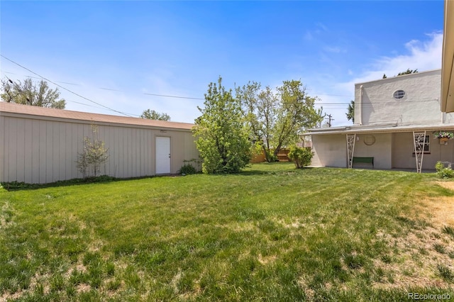 1400 S Knox Ct, Denver, CO 80219 - view of green lawn