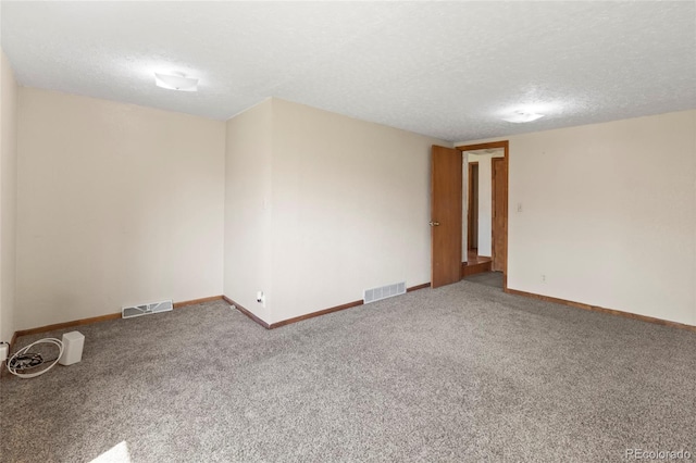 1400 S Knox Ct, Denver, CO 80219 - carpeted empty room featuring a textured ceiling and baseboards