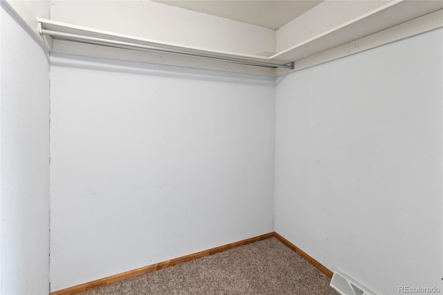 1400 S Knox Ct, Denver, CO 80219 - spacious closet featuring carpet floors
