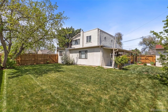 1400 S Knox Ct, Denver, CO 80219 - rear view of house featuring a gate