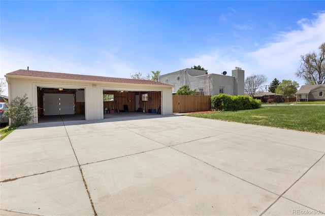 1400 S Knox Ct, Denver, CO 80219 - view of side of property featuring concrete driveway