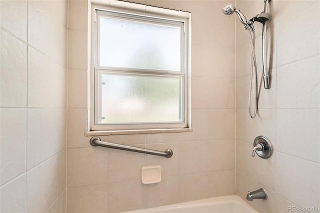 5556 Vaughn St, Denver, CO 80239 - bathroom featuring shower / tub combination