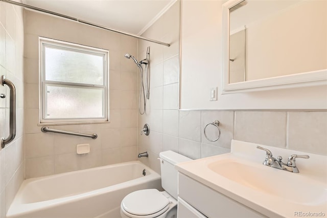 5556 Vaughn St, Denver, CO 80239 - full bathroom featuring tile walls, bathtub / shower combination, and vanity