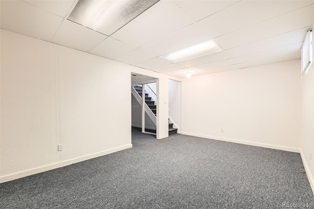 5556 Vaughn St, Denver, CO 80239 - finished basement with dark carpet and stairs