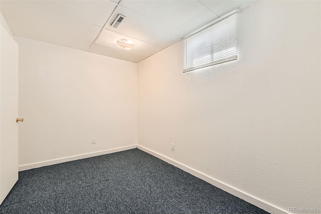5556 Vaughn St, Denver, CO 80239 - spare room featuring dark carpet and baseboards