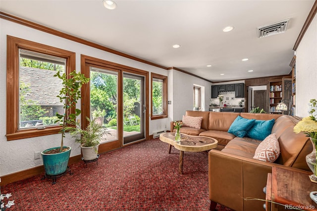 1795 N Monaco St Parkway, Denver, CO 80224 - carpeted living area featuring ornamental molding, recessed lighting, baseboards, a baseboard radiator, and a textured wall