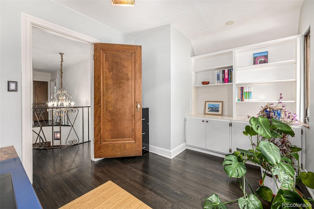 1795 N Monaco St Parkway, Denver, CO 80224 - living area featuring dark wood-style flooring, a chandelier, and baseboards