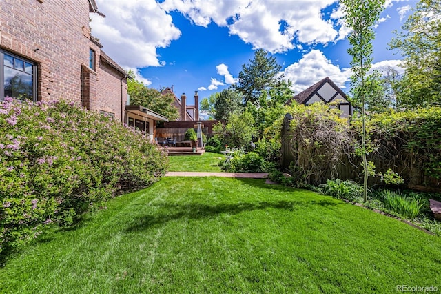 1795 N Monaco St Parkway, Denver, CO 80224 - view of yard featuring a wooden deck