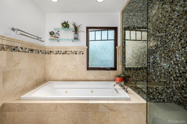 1795 N Monaco St Parkway, Denver, CO 80224 - bathroom featuring a tub with jets, a stall shower, a wainscoted wall, and tile walls