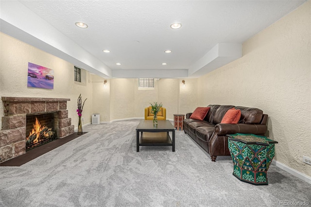 1795 N Monaco St Parkway, Denver, CO 80224 - carpeted living area with a textured wall, recessed lighting, baseboards, and a fireplace