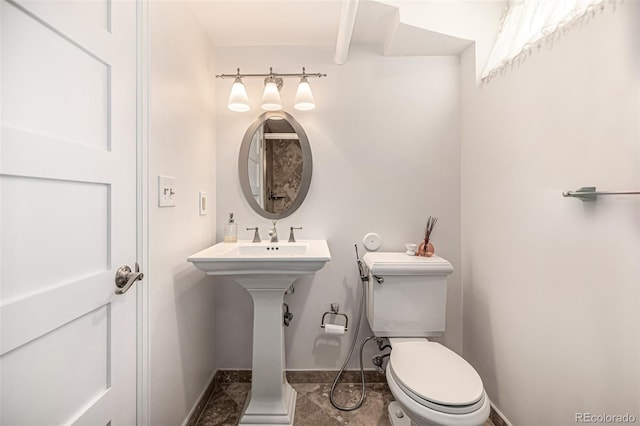 1795 N Monaco St Parkway, Denver, CO 80224 - half bathroom featuring toilet and baseboards
