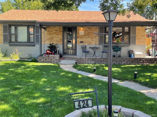 view of front of home with a front yard