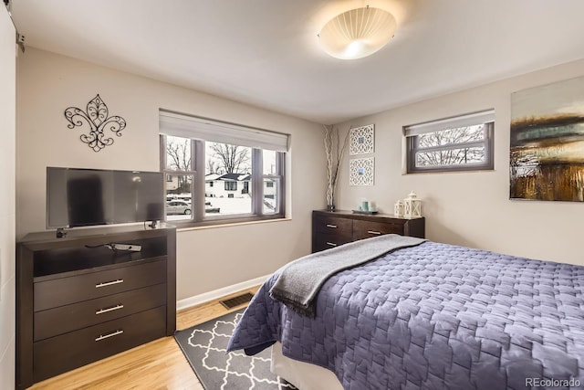 424 S Leyden St, Denver, CO 80224 - bedroom with wood finished floors and baseboards