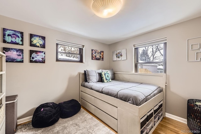 424 S Leyden St, Denver, CO 80224 - bedroom featuring baseboards and wood finished floors