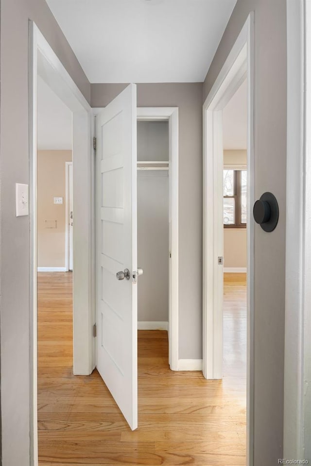 424 S Leyden St, Denver, CO 80224 - hallway featuring light wood-style floors and baseboards