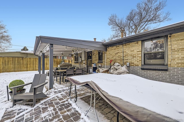 424 S Leyden St, Denver, CO 80224 - snow covered patio featuring outdoor dining area and fence