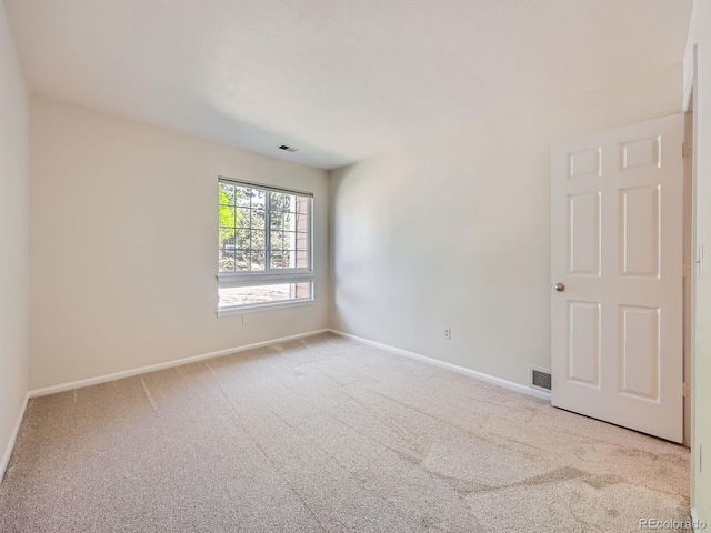 13598 E Asbury Dr, Aurora, CO 80014 - spare room with carpet flooring and baseboards