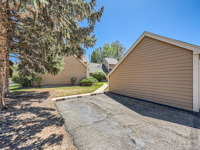 13598 E Asbury Dr, Aurora, CO 80014 - view of property exterior featuring uncovered parking