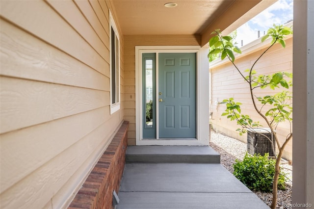 1157 Belleview Dr, Fort Collins, CO 80526 - view of exterior entry with central air condition unit