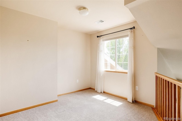 1157 Belleview Dr, Fort Collins, CO 80526 - spare room featuring light carpet and baseboards