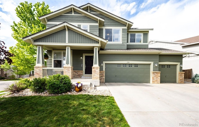 5550 Fox Meadow Ave, Highlands Ranch, CO 80130 - craftsman-style house with driveway, covered porch, a garage, and a front yard