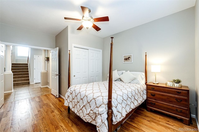 5550 Fox Meadow Ave, Highlands Ranch, CO 80130 - bedroom with a closet, light wood-style flooring, baseboards, and ceiling fan