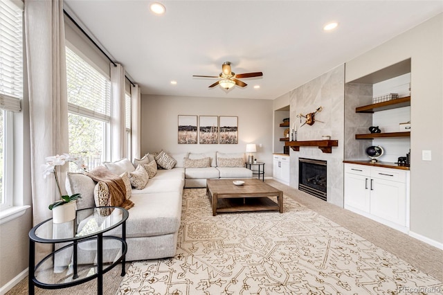 5550 Fox Meadow Ave, Highlands Ranch, CO 80130 - living room featuring a fireplace, a ceiling fan, recessed lighting, carpet flooring, and baseboards