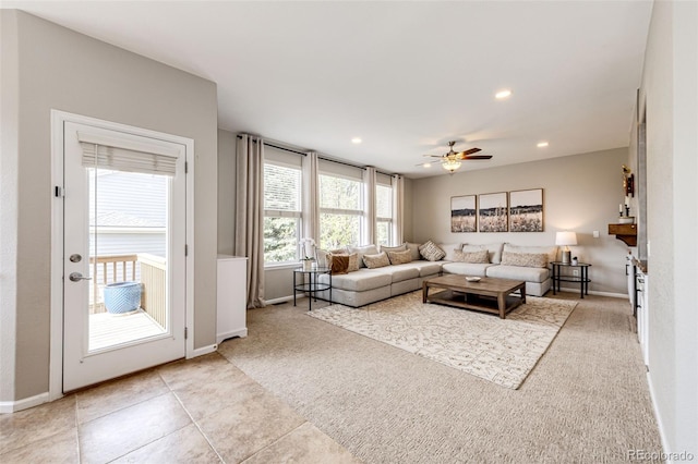 5550 Fox Meadow Ave, Highlands Ranch, CO 80130 - living area featuring a ceiling fan, baseboards, recessed lighting, and light colored carpet
