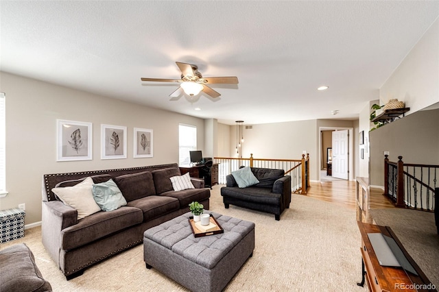5550 Fox Meadow Ave, Highlands Ranch, CO 80130 - living area featuring light colored carpet, ceiling fan, recessed lighting, and baseboards