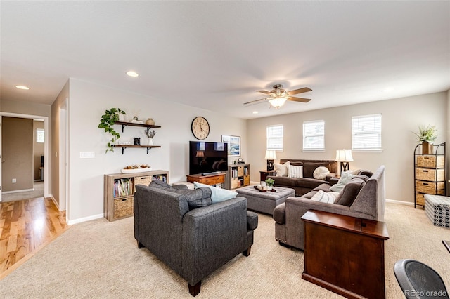 5550 Fox Meadow Ave, Highlands Ranch, CO 80130 - living area featuring recessed lighting, a ceiling fan, light colored carpet, and baseboards