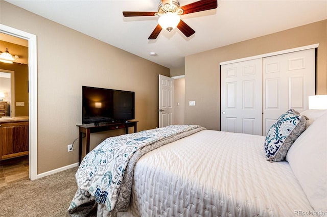 5550 Fox Meadow Ave, Highlands Ranch, CO 80130 - carpeted bedroom with a closet, baseboards, connected bathroom, and a ceiling fan