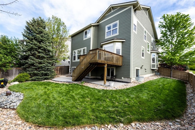 5550 Fox Meadow Ave, Highlands Ranch, CO 80130 - back of house with a patio area, stairs, and a wooden deck