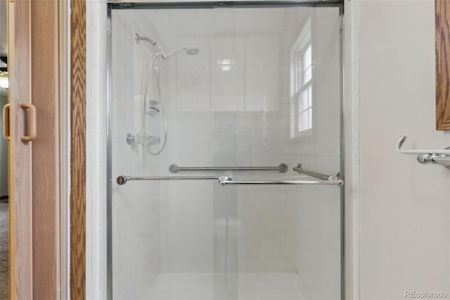 full bath featuring a stall shower