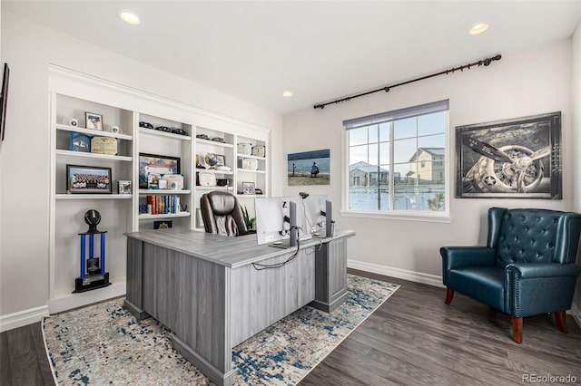 office with dark hardwood / wood-style floors