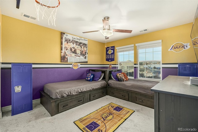 bedroom featuring ceiling fan and light colored carpet