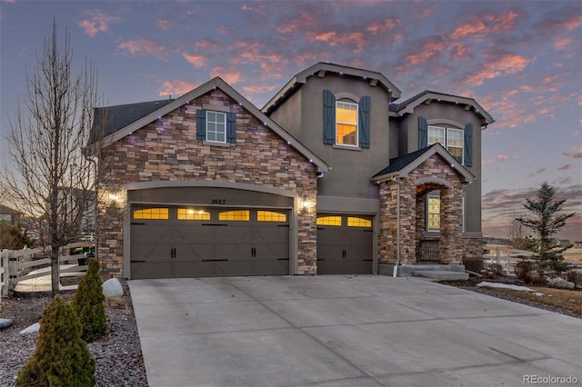 view of front of home with a garage