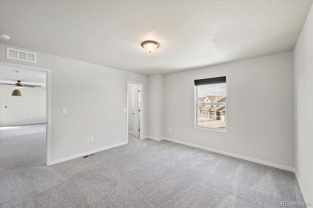 1711 Lazear St, Loveland, CO 80538 - carpeted empty room featuring baseboards, a ceiling fan, and a textured ceiling