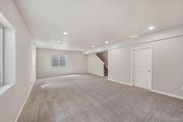 1711 Lazear St, Loveland, CO 80538 - below grade area with recessed lighting, carpet, stairway, and baseboards