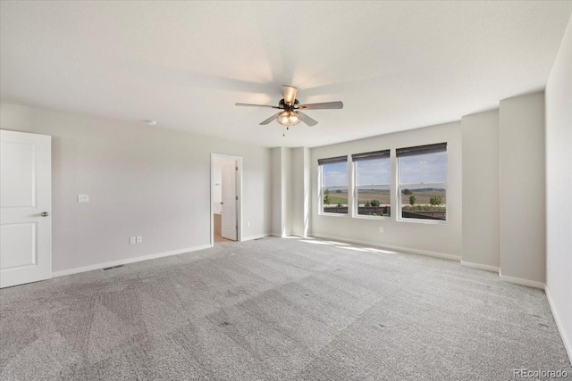 1711 Lazear St, Loveland, CO 80538 - unfurnished room featuring ceiling fan, carpet flooring, and baseboards