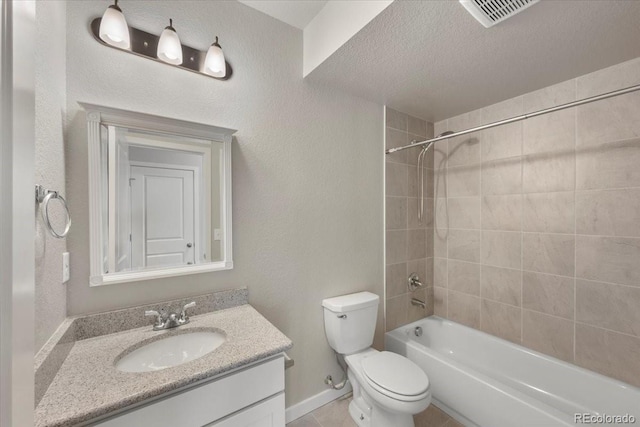 1711 Lazear St, Loveland, CO 80538 - bathroom with vanity, toilet, washtub / shower combination, baseboards, and a textured ceiling