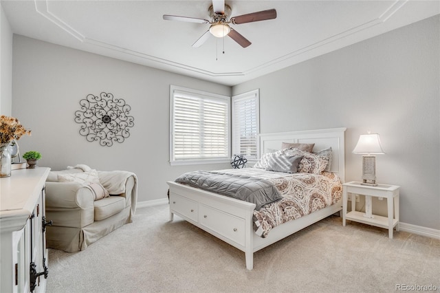 bedroom with light colored carpet and ceiling fan