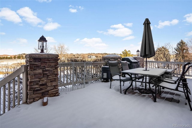 view of snow covered patio