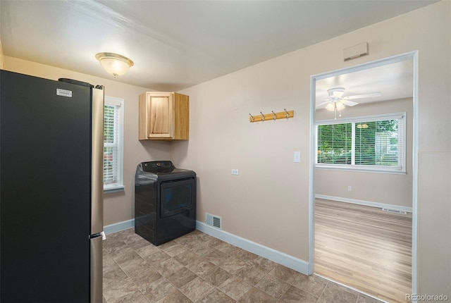 1200 Newark St, Aurora, CO 80010 - laundry room with washer / clothes dryer, cabinet space, and a ceiling fan