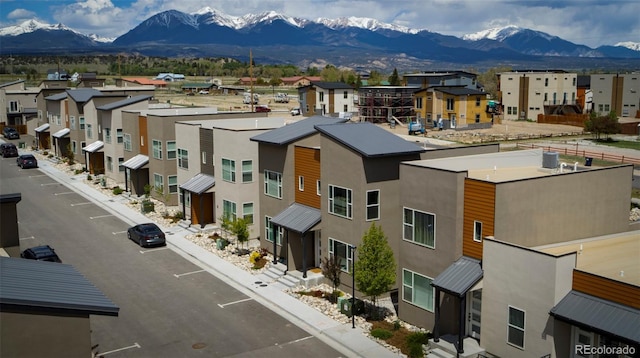 exterior space featuring a residential view and a mountain view