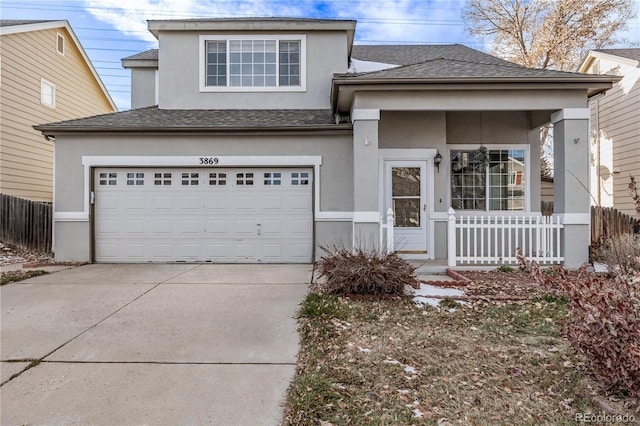 view of front of house with a porch and a garage