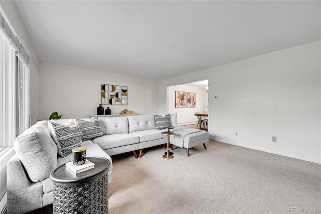 7076 S Spruce Dr W, Centennial, CO 80112 - living room featuring carpet floors and baseboards