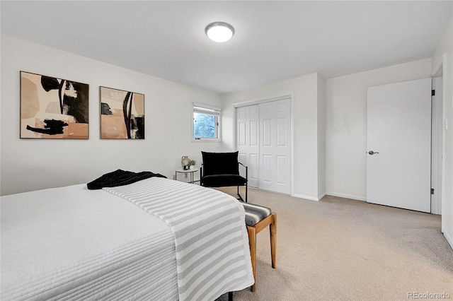 7076 S Spruce Dr W, Centennial, CO 80112 - bedroom with carpet floors, a closet, and baseboards